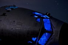 the-cockpit-section-of-a-c-141-starlifter-sits-dissected-and-strapped-to-the-ground.jpg