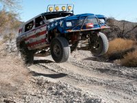 154_0711_01_z+05_truckin_nationals_1979_jeep_cherokee_race+in_air.jpg