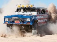 154_0711_12_z+05_truckin_nationals_1979_jeep_cherokee_race+front_view.jpg