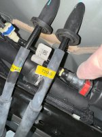 ebrake cables resting on evap vapor tube.jpeg ebrake cables resting on evap vapor tube.jpeg