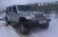 Faust Jeep snow trail lights on.jpg