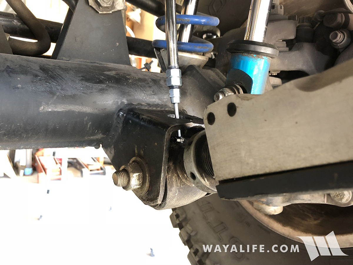 greasing front lower control arm joint